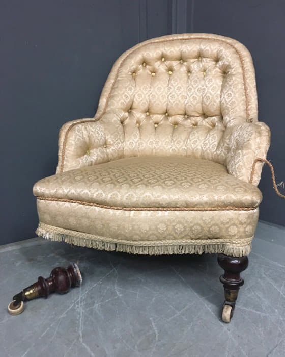 Antique armchair in need of upholstering