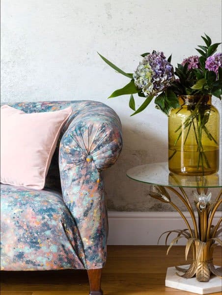 Close up of restored Chesterfield sofa in living room