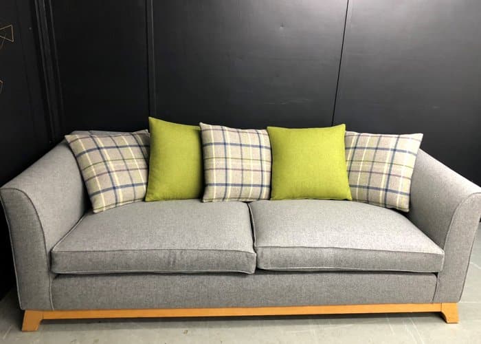 Reupholstered sofa in Abraham Moon & Sons fabric