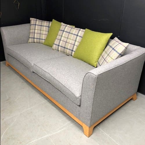 Reupholstered sofa in Abraham Moon & Sons fabric