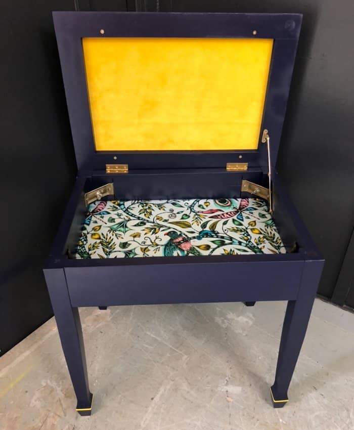 Bright velvet Kirkby Design fabric on piano stool