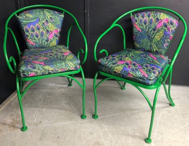 Repaired iron garden chairs in luminous green