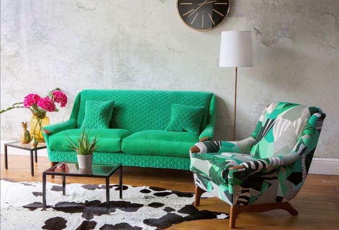 Reupholstered mid-century sofa and armchair in green fabric