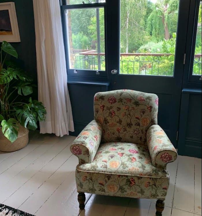Armchair reupholstered in patterned flower velvet
