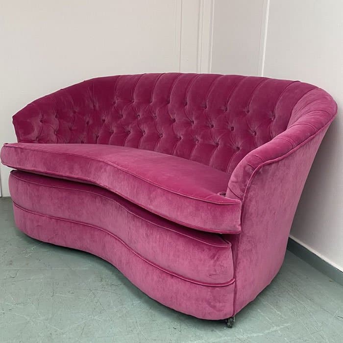 Reupholstered pink sofa