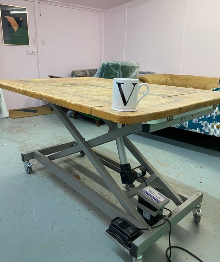 Upholstery workshop hydraulic table with pine top