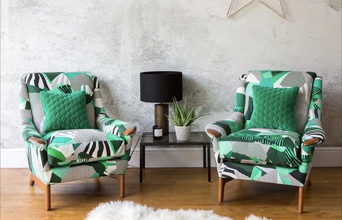Reupholstered green, black and white armchairs