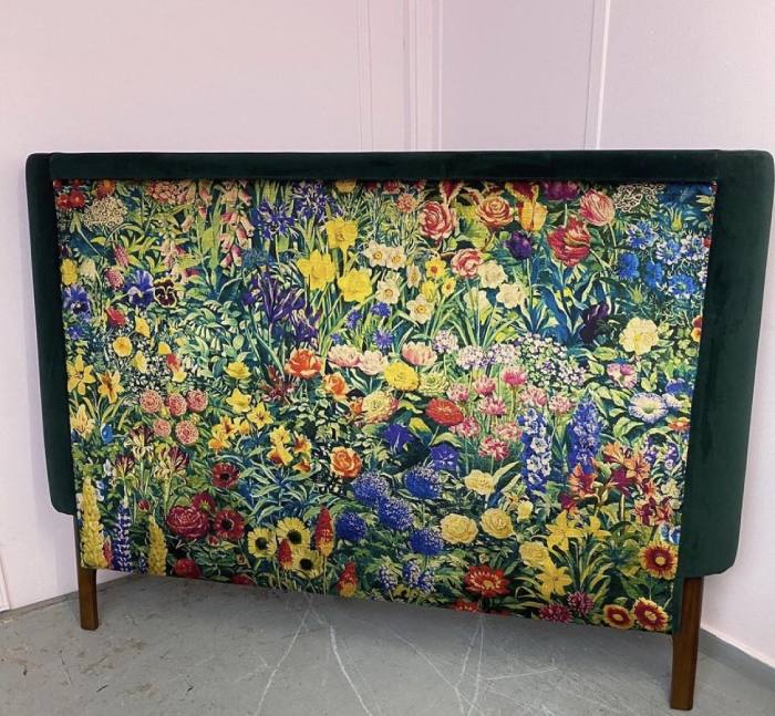 Floral patterned reupholstered headboard