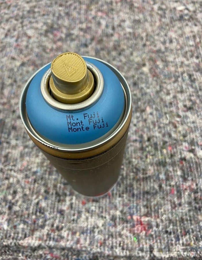 Can of blue spray paint