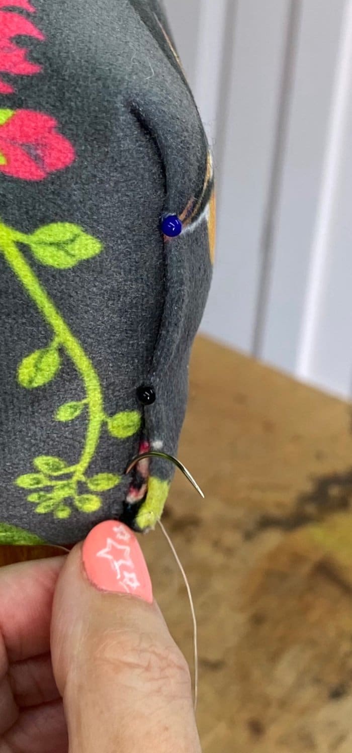 How to slip stitch - Semi-circular needle threading into chair fabric