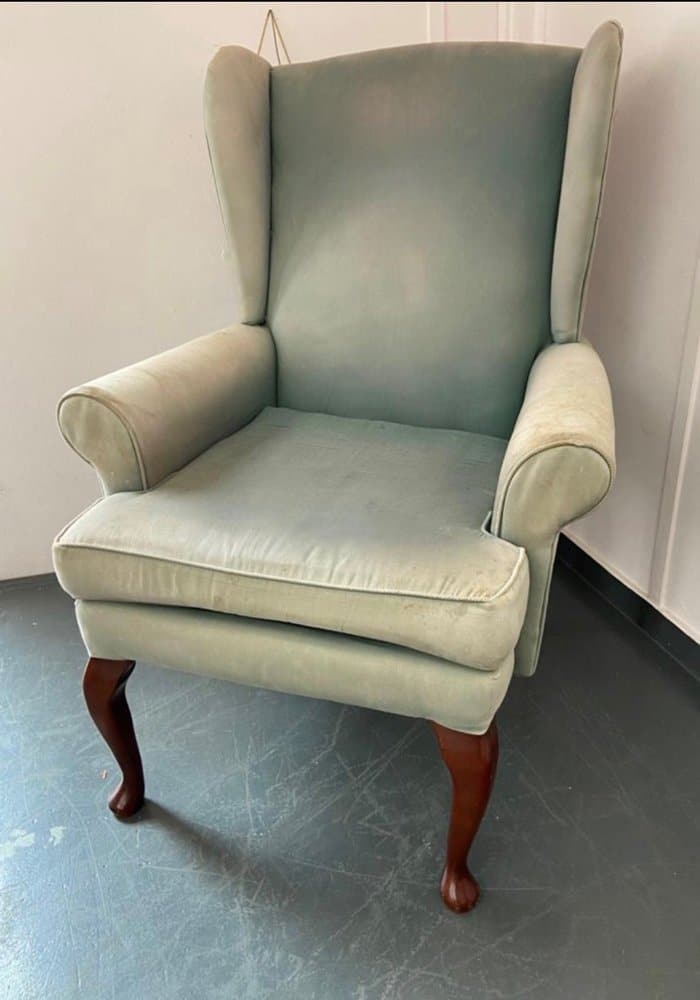 the chair before being reupholstered