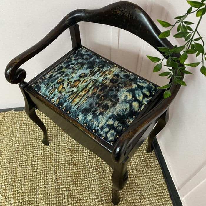 a piano stool used for an upholstery project