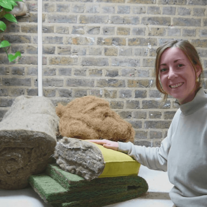 Vanessa Butt alongside raw materials used in her sustainable Thought-Fill cushions