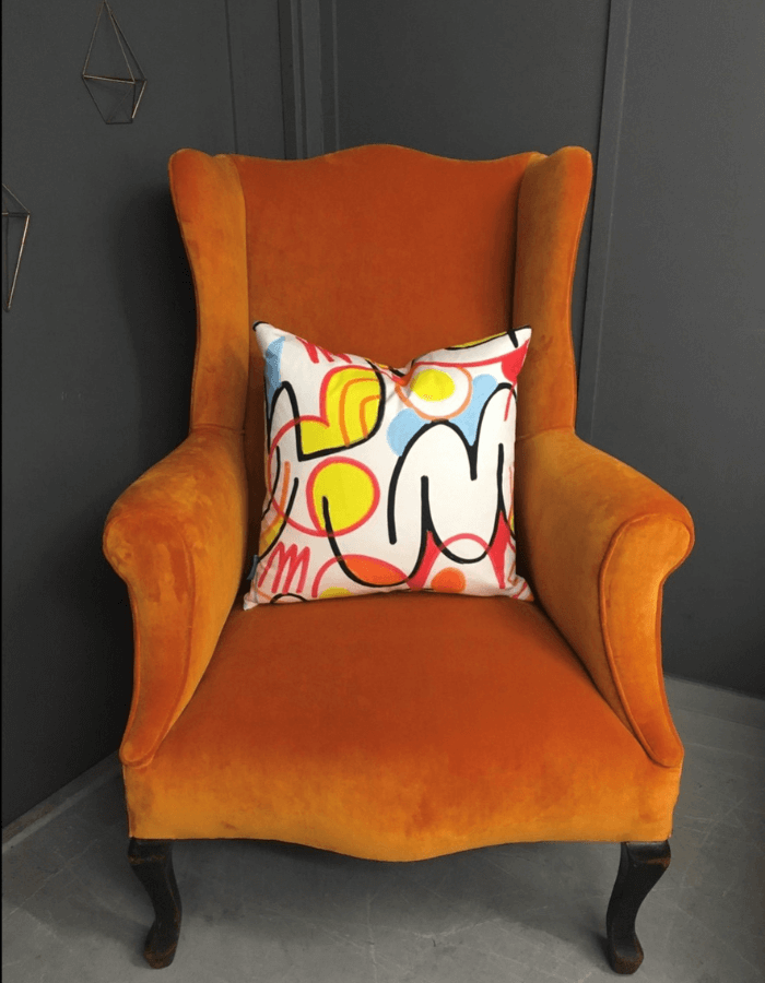 Parker Knoll chair reupholstered in Omega II Satsuma by Linwood  