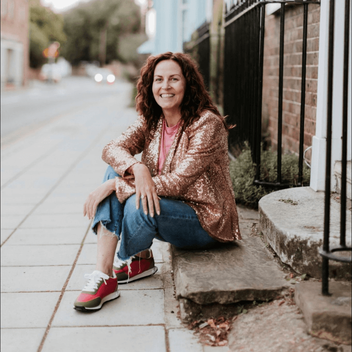 Sharon O'Connor sat outside house happy after starting business