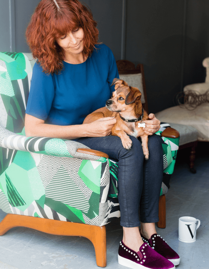 Sharon O'Connor on first brand photoshoot sat with pet dog