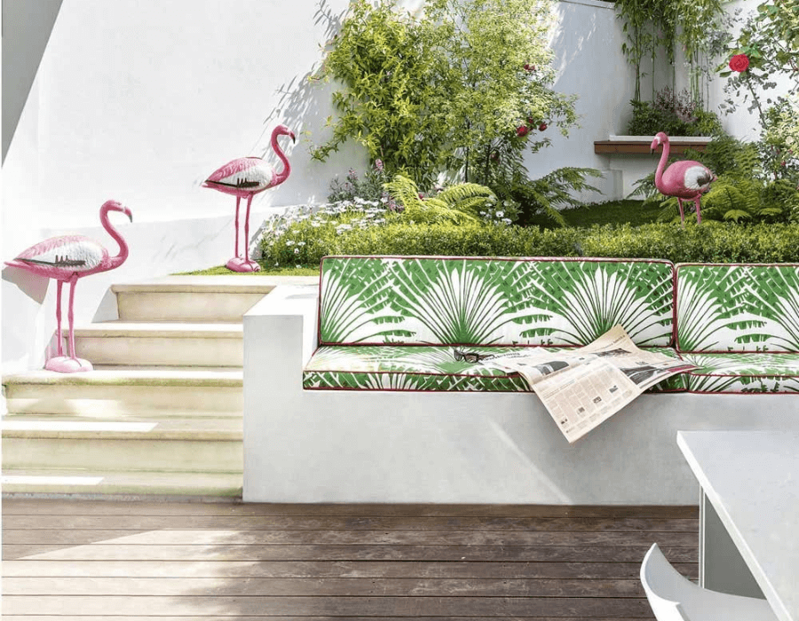 Outdoor cushions upholstered in Palma Verde by Michael Szell