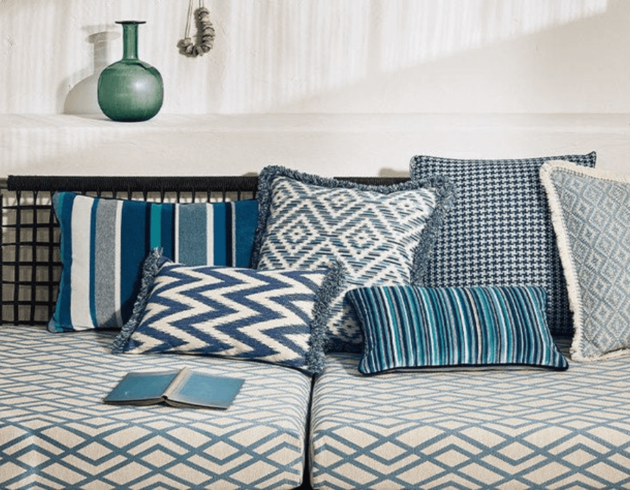 Outdoor seating upholstered in Nicoya Calita outdoor fabric in colour Surf.