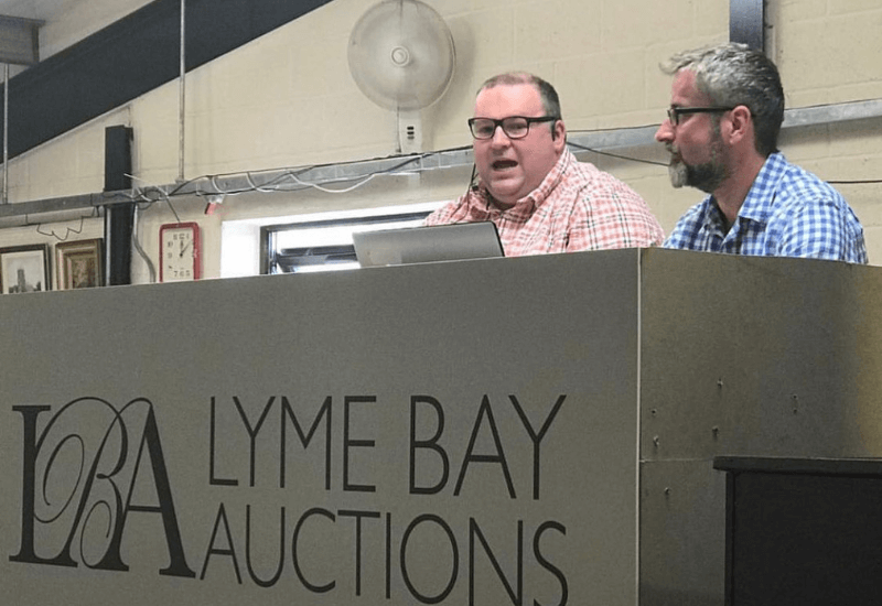 Podcast hosts and auctioneers at Lyme Bay Auctions, Harry and Simon.