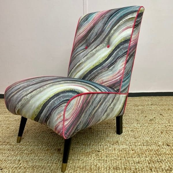1970s chair reupholstered in patterned velvet with contrast piping