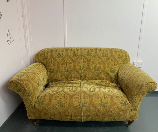 2 seater sofa in need of reupholstery