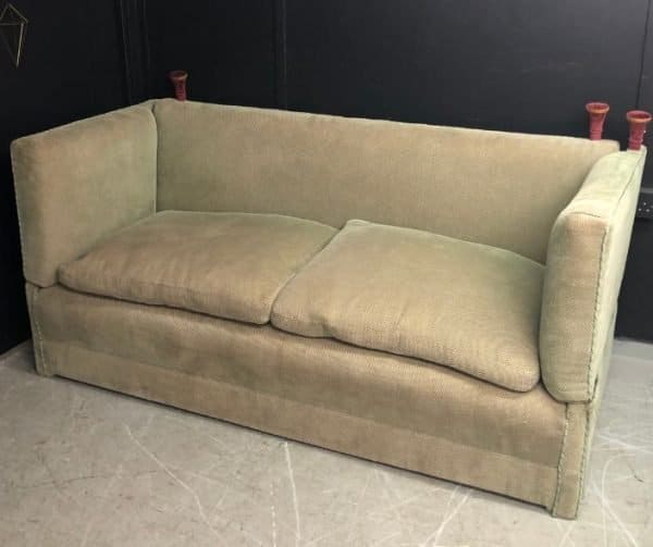 Beige sofa in need of reupholstery