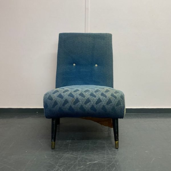 Blue 1970s chair in need of reupholstery