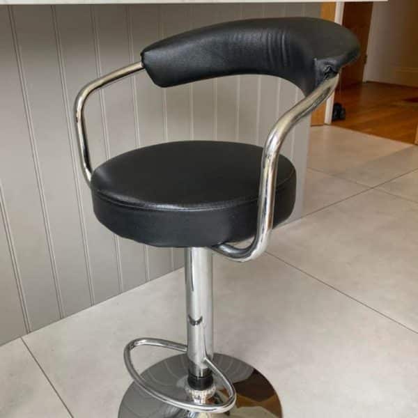 High stool with black PVC style covering awaiting reupholstery
