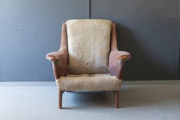 Mid century chair in need of reupholstery