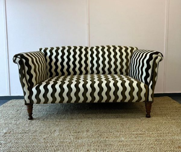 Monochrome black and white reupholstered sofa