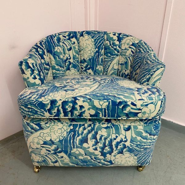 Reupholstered chair in blue, green and neutral print