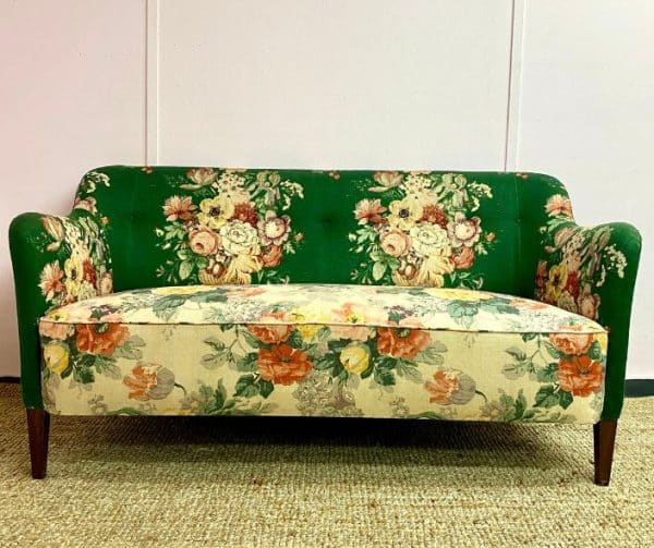 A chintsy reupholstery transformation in Albertine Summer Rose from Linwood fabric on a small sofa