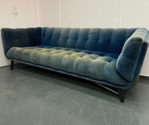 Unique button backed sofa in need of reupholstery