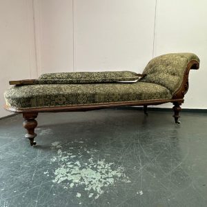 damaged chaise longue in need of reupholstery