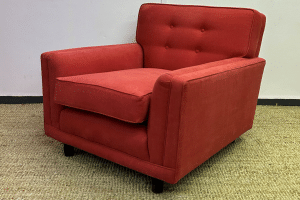 Orange G-Plan armchair is reupholstered and transformed to its former glory.