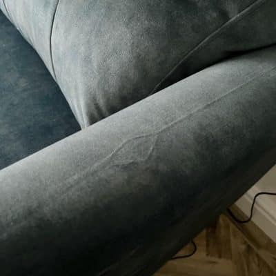 Velvet fabric compression marks to the arms of a new sofa.