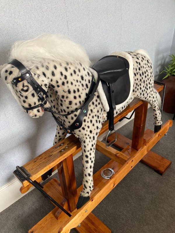 Photo of restored rocking horse Spotty Dobbin back on his stand