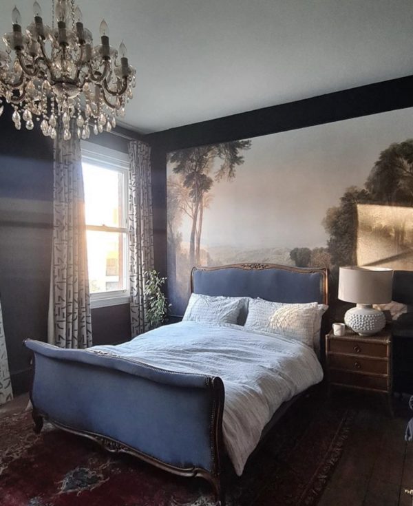 Double bed with headboard covered in a velvet fabric from Kirkby Fabrics