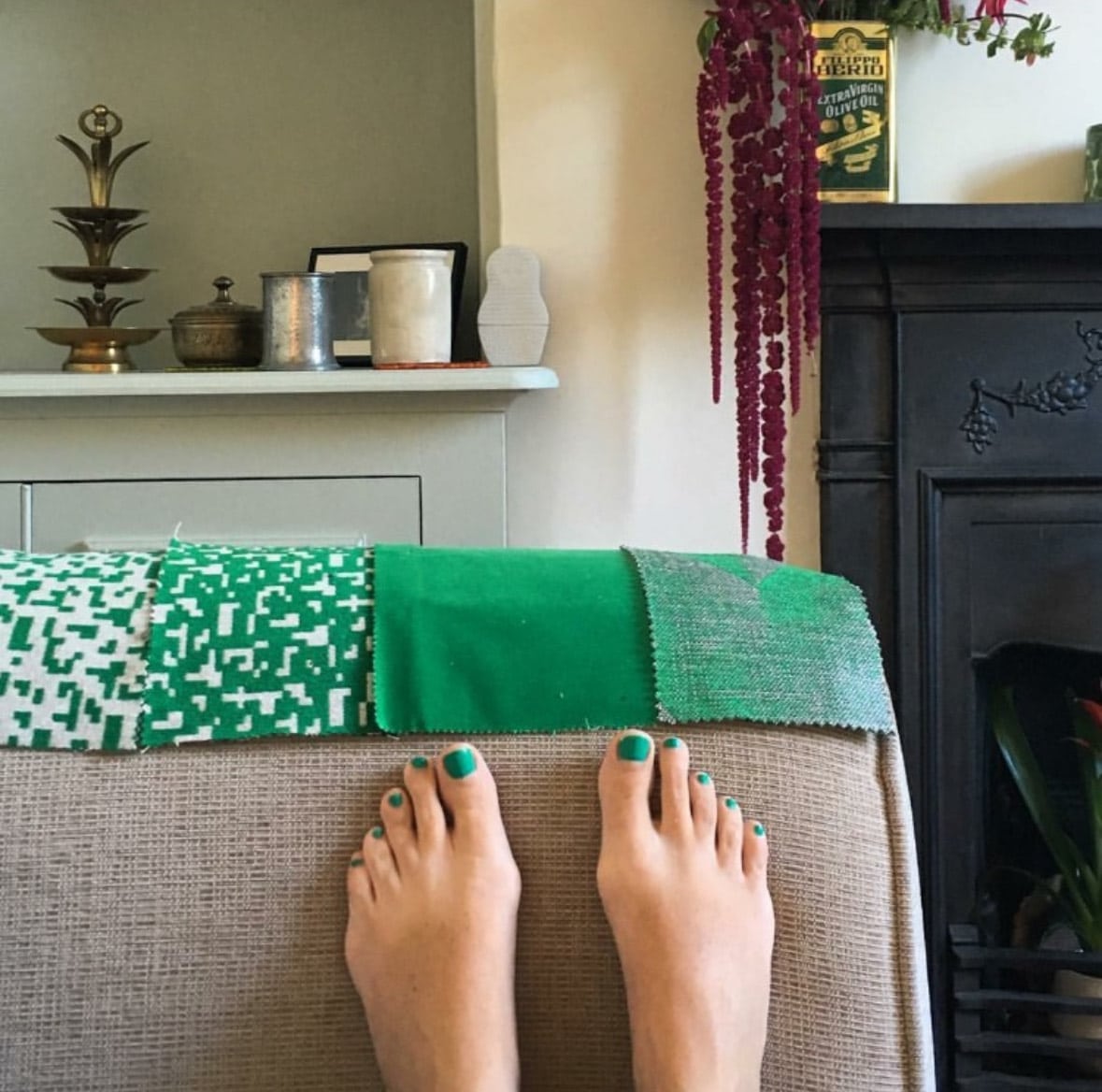 A picture of my pedicure that inspired the colour of my sofa