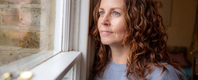 Sharon O'Conner - Vintique Upholstery owner looking out of window