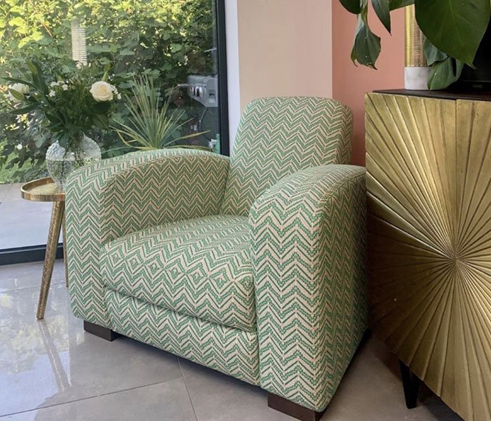 Reupholstered arm chair in zig zag fabric