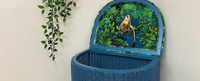 Upholstered blue patterned Lloyd Loom Ottoman lid