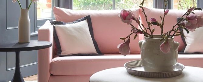 Linwood Fabrics sofa featuring pink recycled fabric from their Verde collection in a lounge