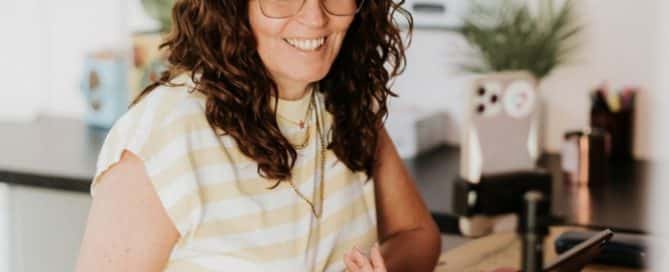 Vintique Upholstery's Sharon O'Connor on a Power Hour call talking into the phone