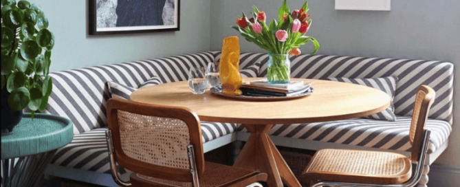 Tori Murphy grey and white stripe sofa in the style of banquette seating
