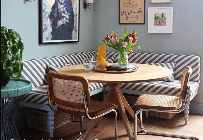 Tori Murphy grey and white stripe sofa in the style of banquette seating