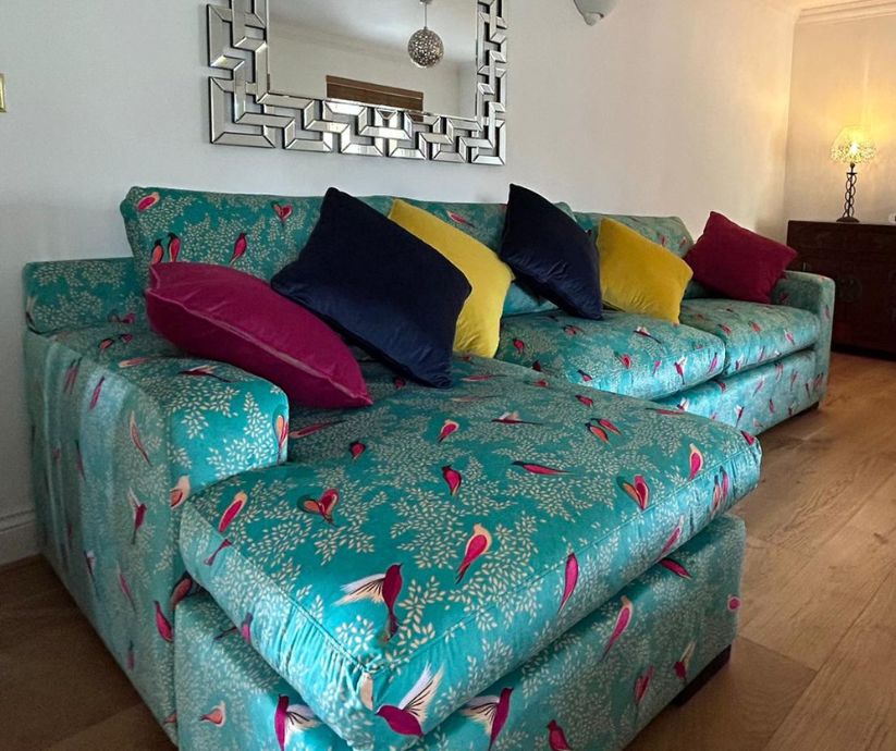 Reupholstered L Shaped Sofa with a tropical bird print
