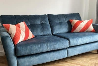 French Connection blue velvet sofa